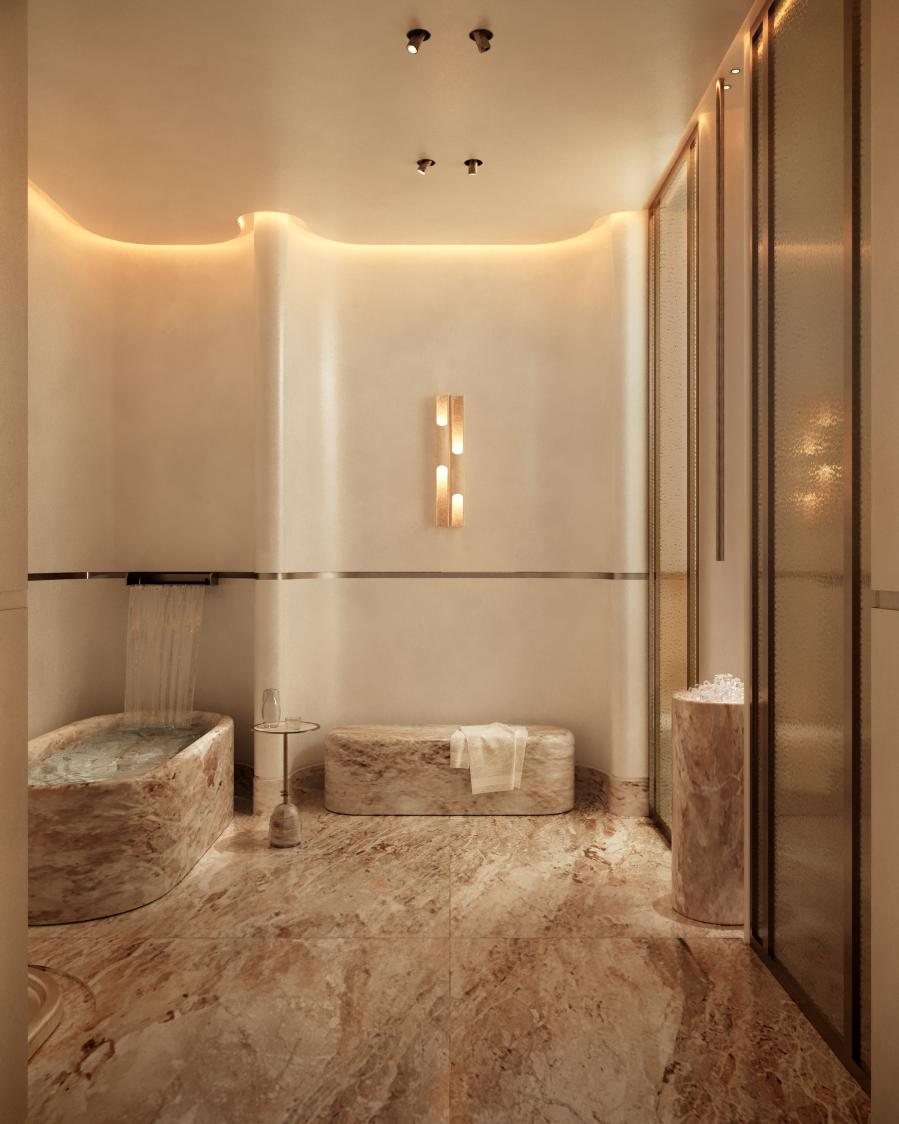Stone bathtub under warm lighting