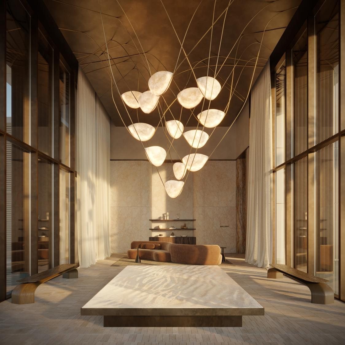 Double-height residence entrance hall with sculptural pendant